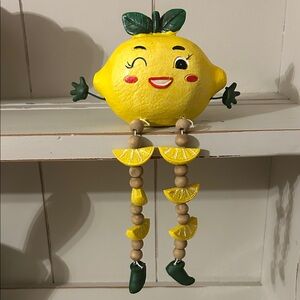 Winking Lemon Shelf Sitter